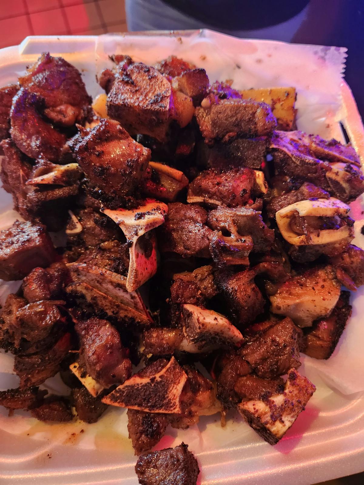 a plate of food with meat and vegetables