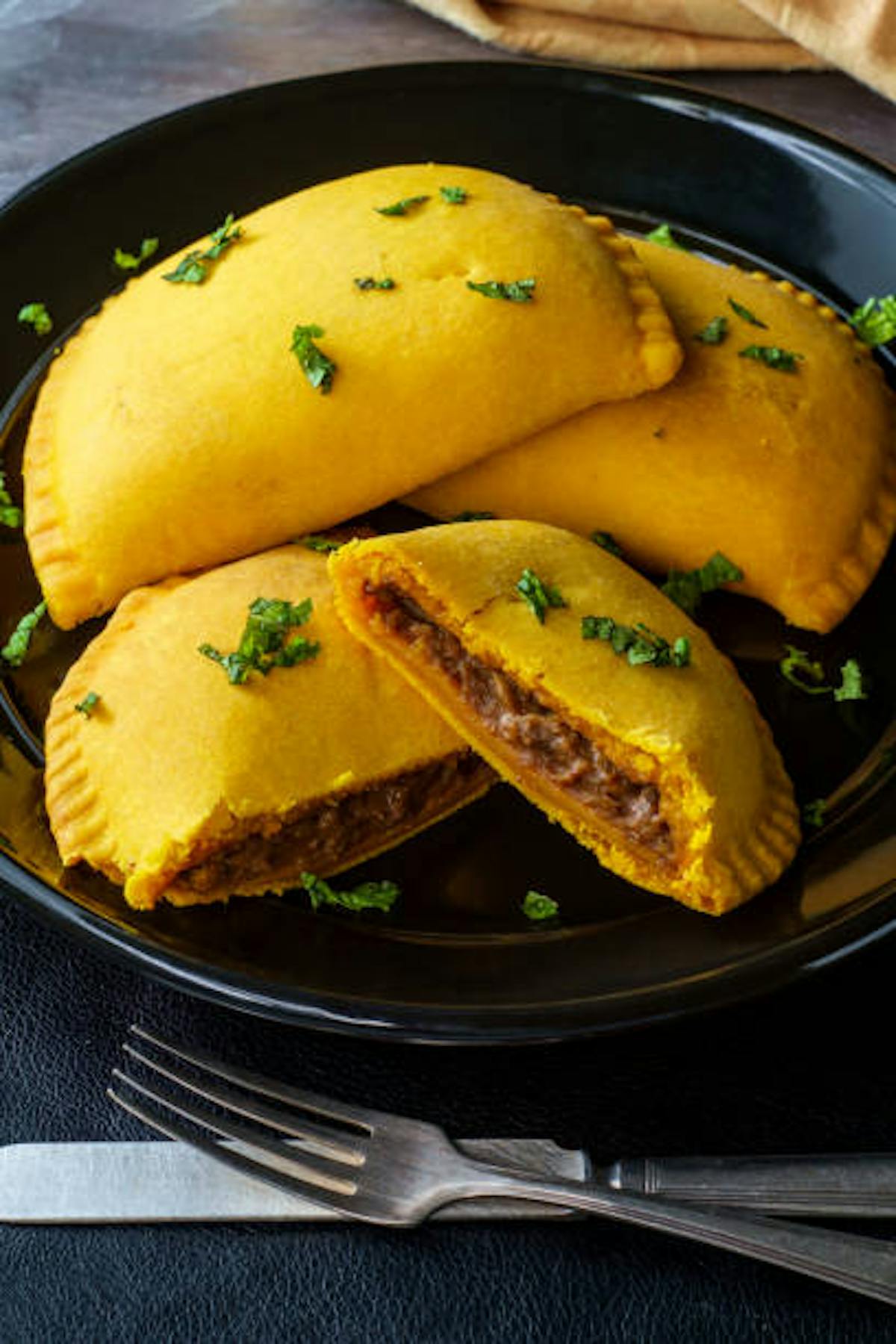 a plate of food with a fork and knife