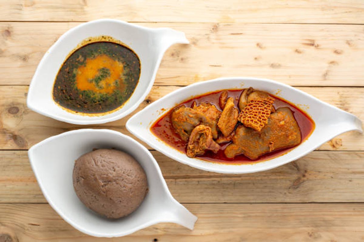 a plate of food sitting on top of a wooden table