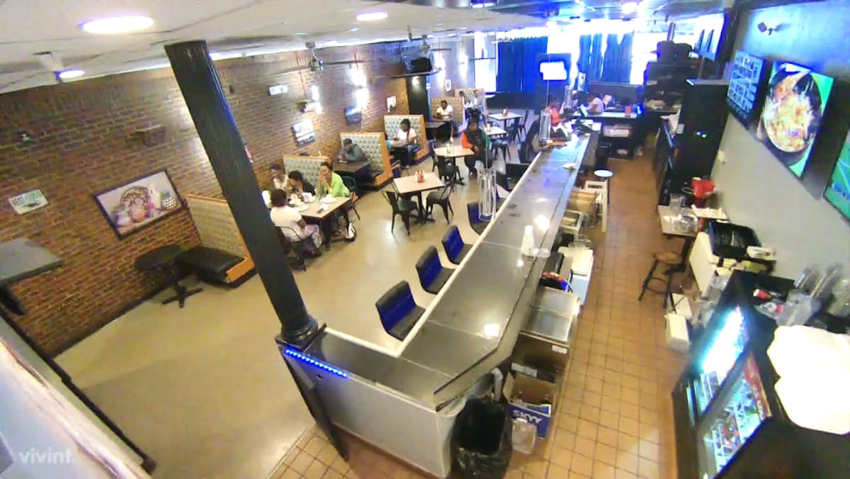 a group of people playing instruments and performing on a counter