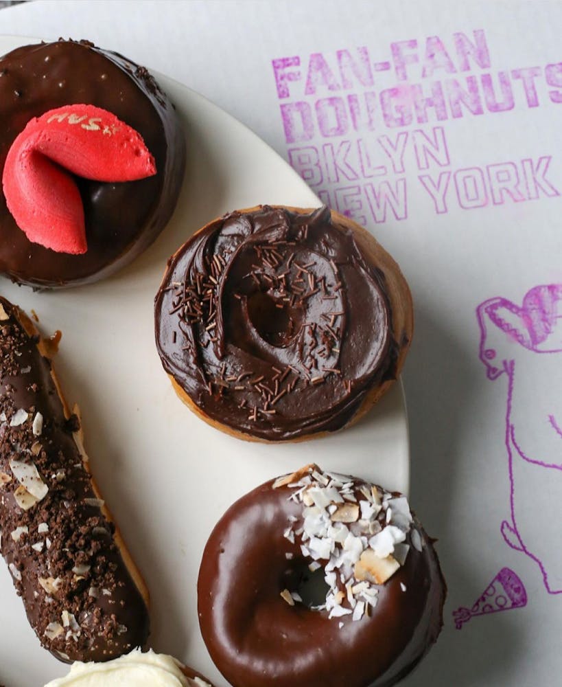 a chocolate doughnut on a plate