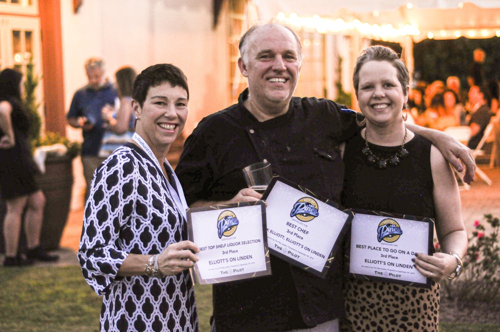 a group of people posing for the camera
