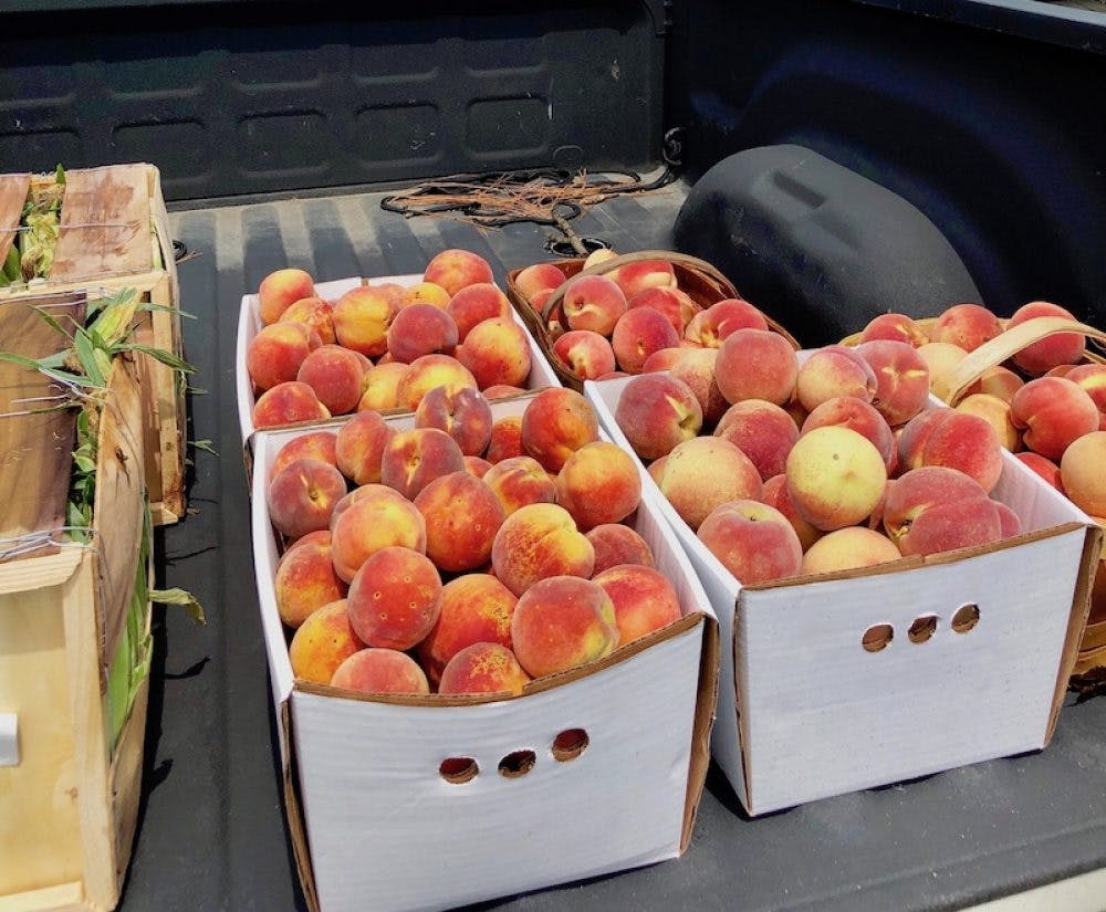 a box filled with different types of fruit