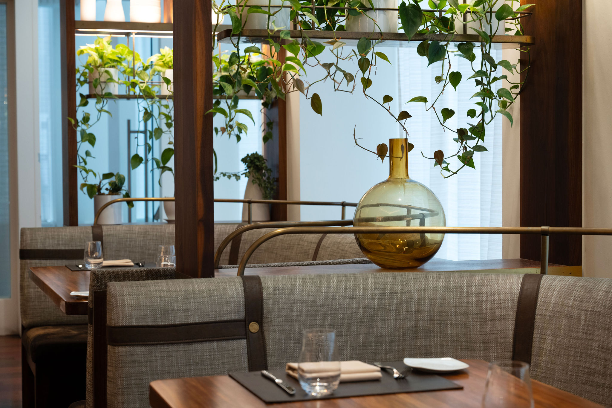 a dining room table in front of a window