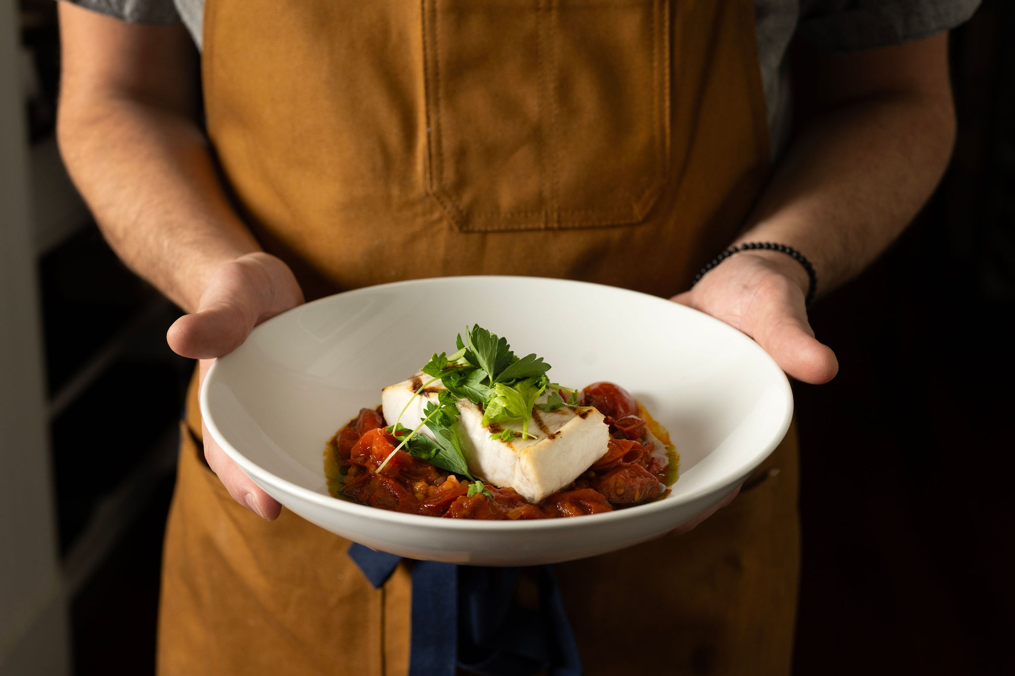 a man holding a plate of food