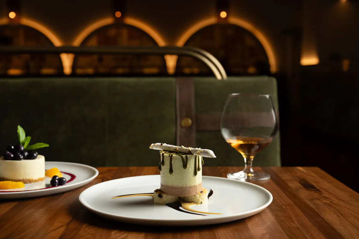 a plate with a glass of wine