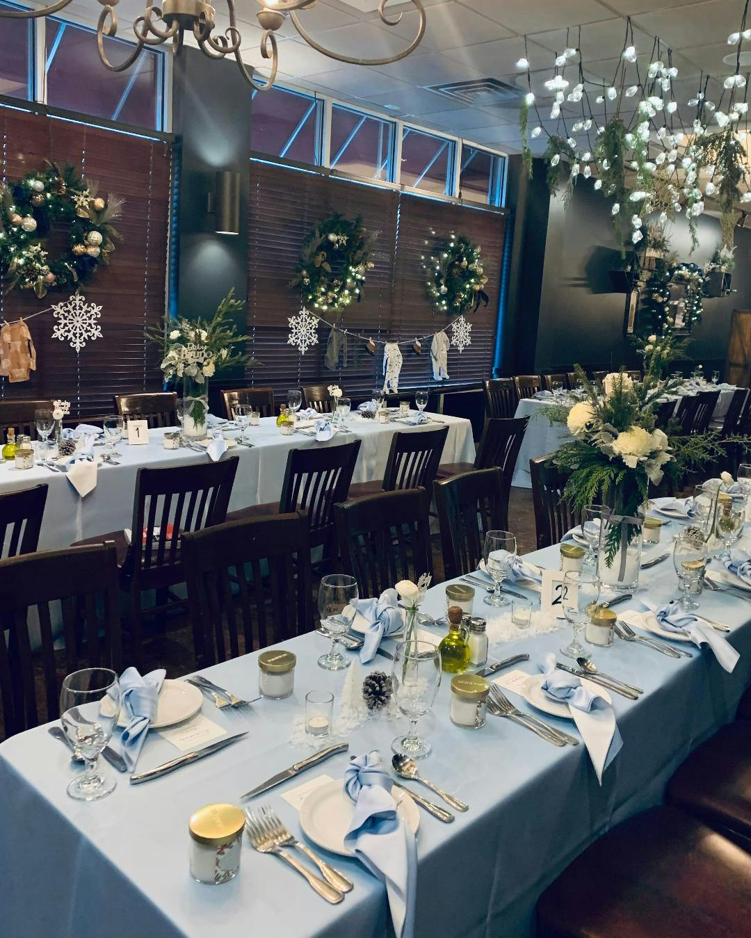 a room filled with furniture and vase of flowers on a table