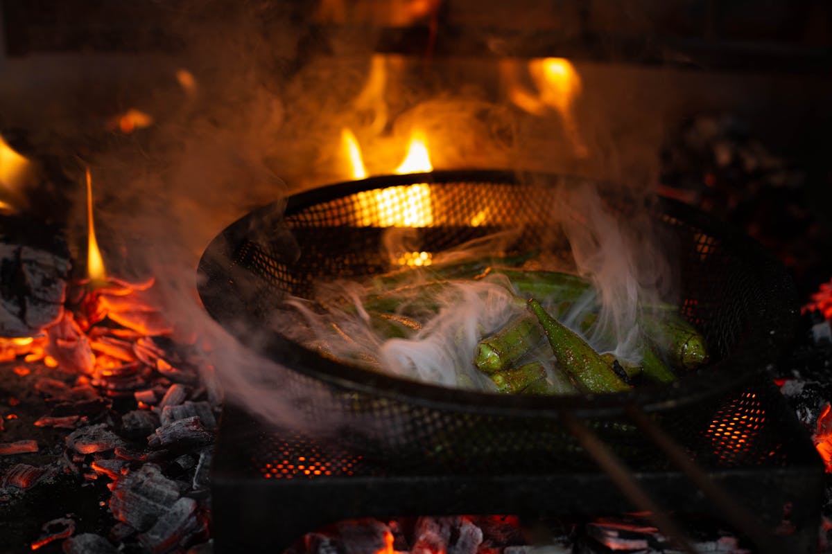 a stove top oven sitting inside of a fire place