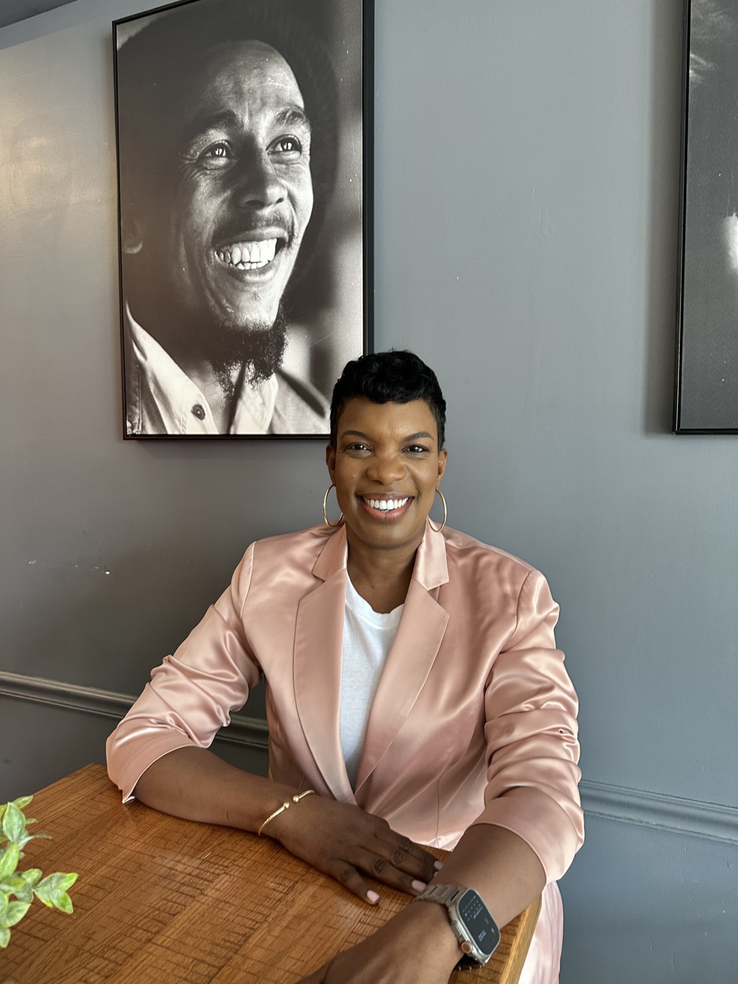 Bob Marley sitting on a table
