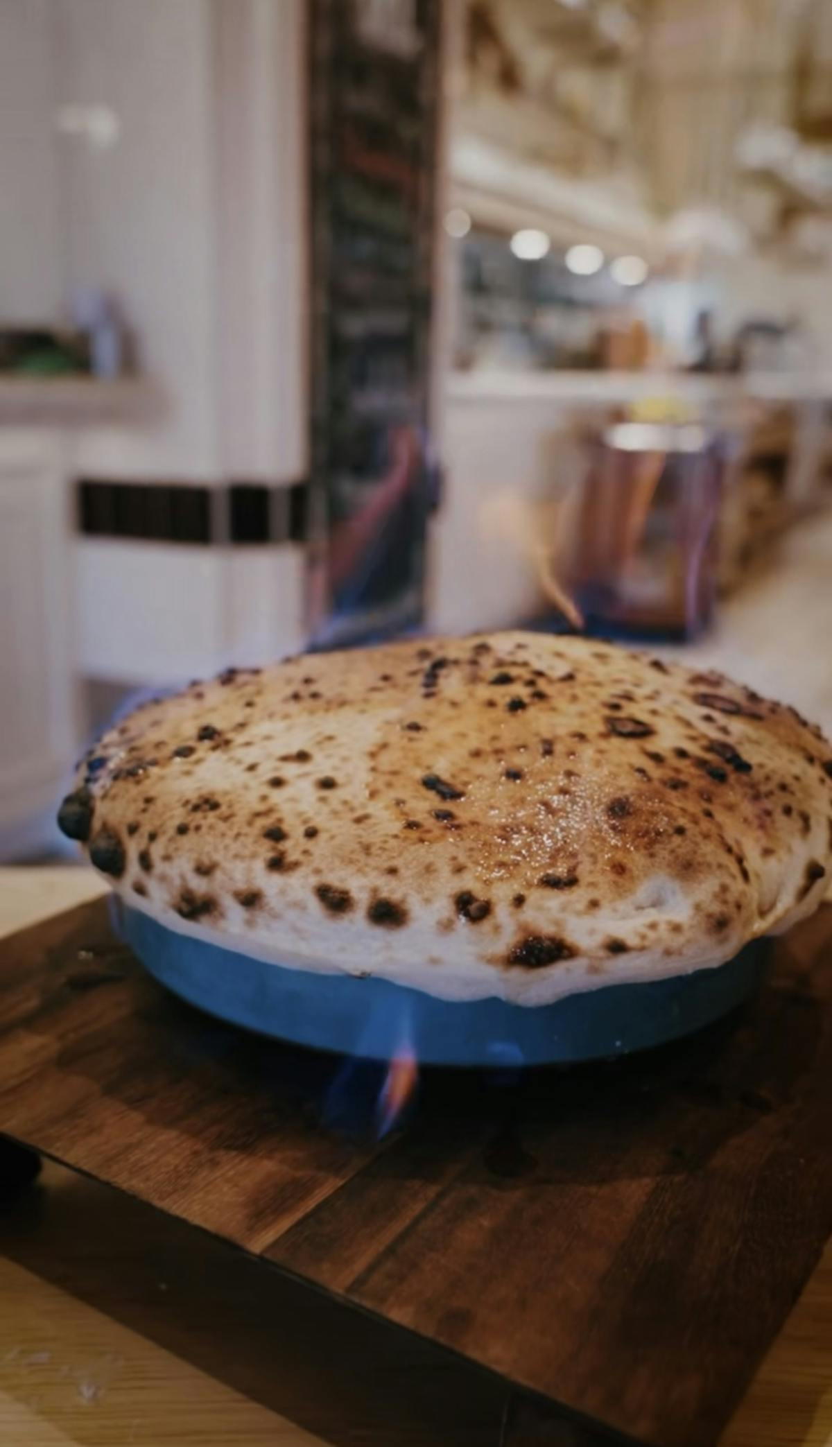 a sandwich sitting on top of a wooden table