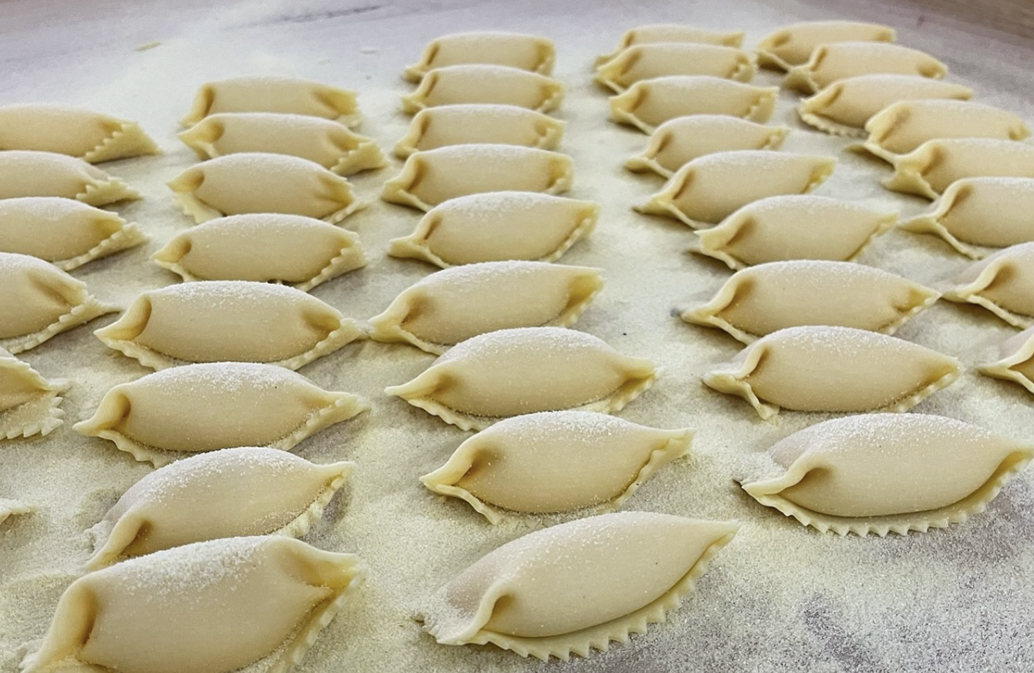 pasta being made from chef's personal shop