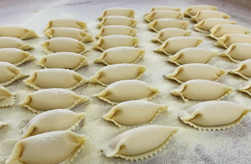 pasta being made from chef's personal shop