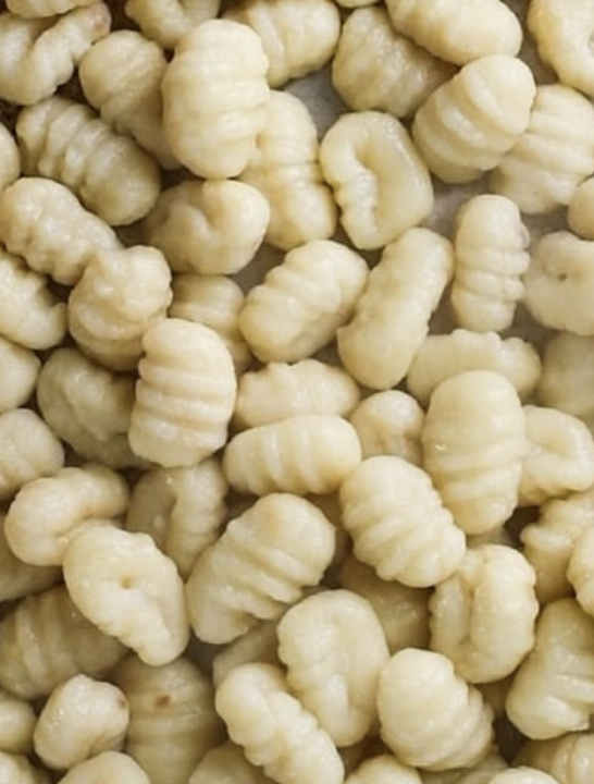 Wondering what gnocchi tastes like? Discover its flavor, pillowy texture, how it’s made, and how Bottiglia serves this classic Italian favorite.