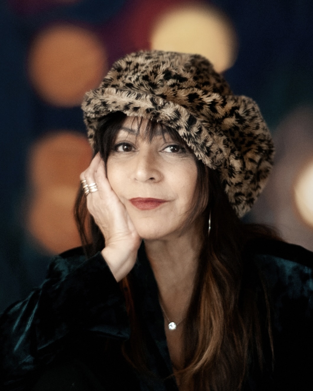 Dina Regine wearing a hat