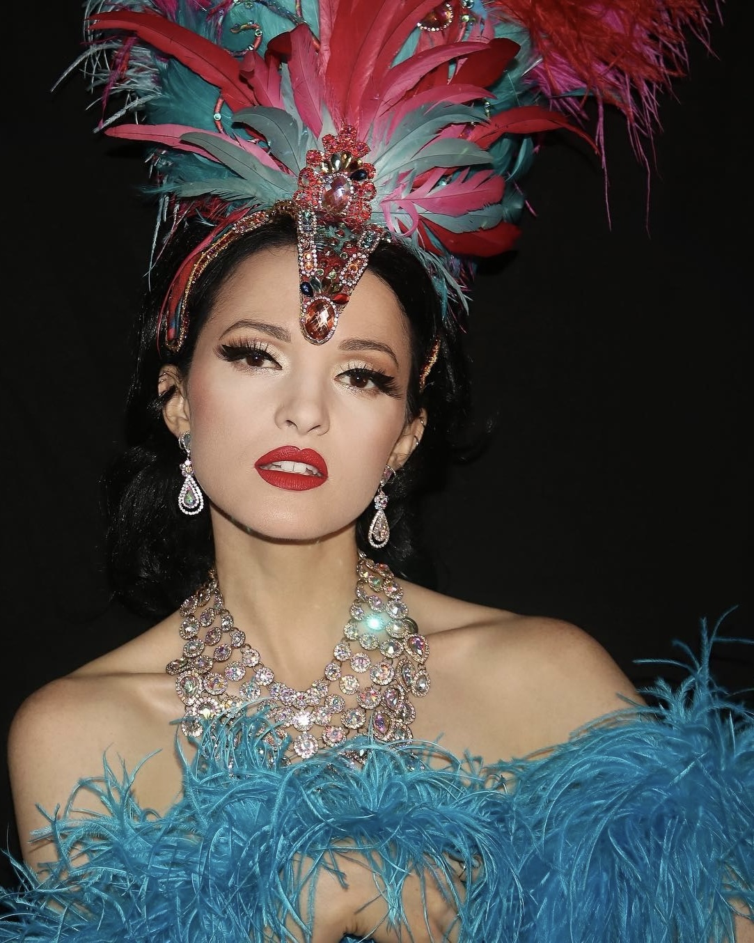 a woman wearing a flower in her hair