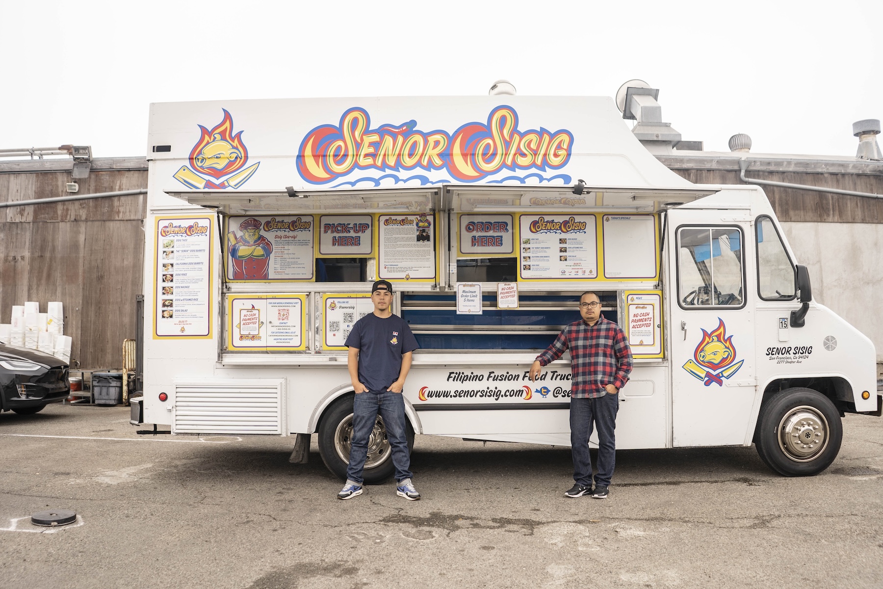 a truck is parked in front of a building