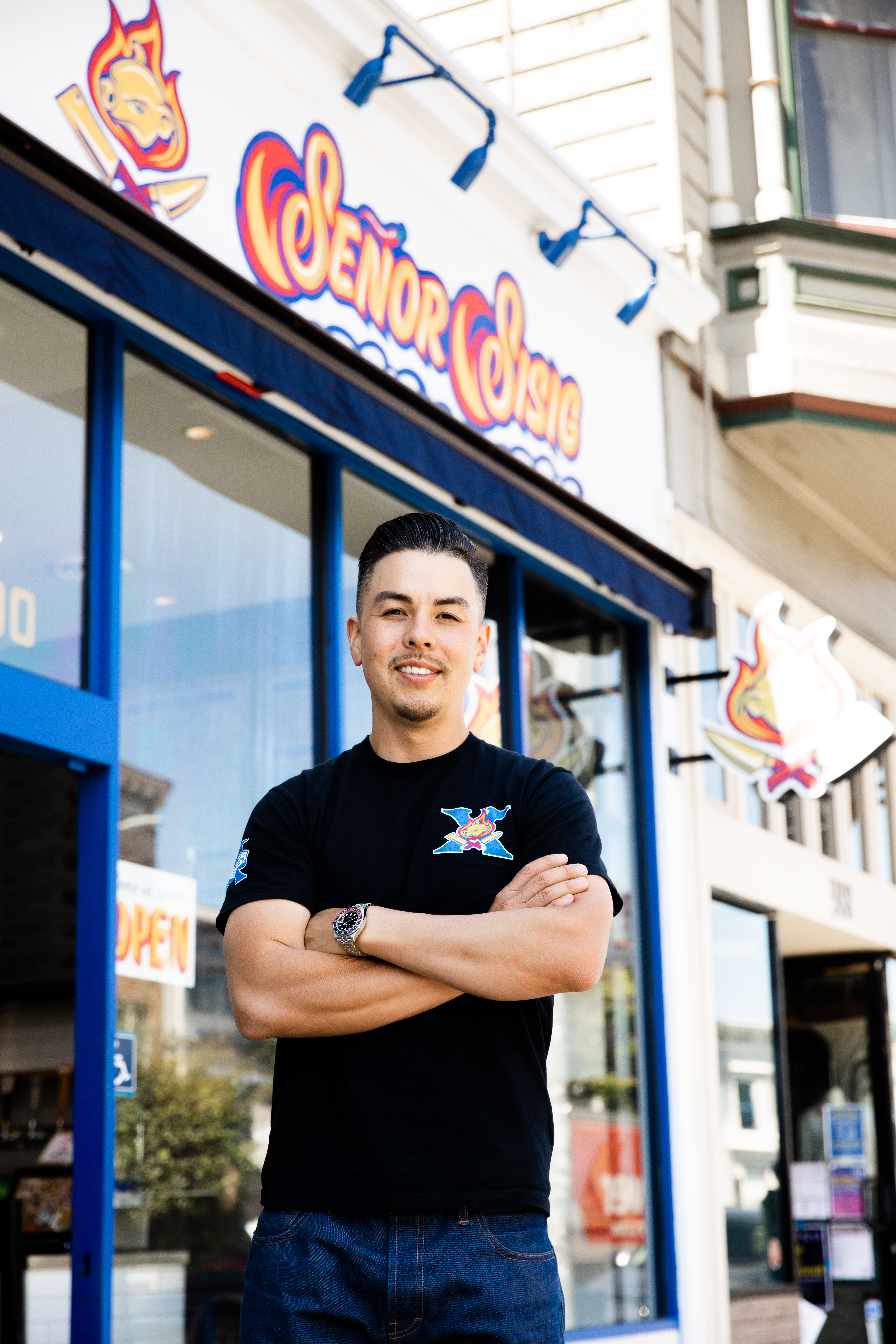 a man standing in front of a store