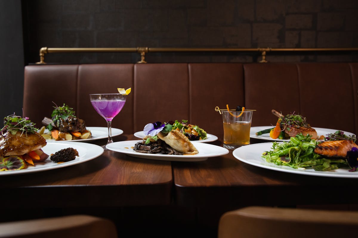 a table topped with plates of food on a plate