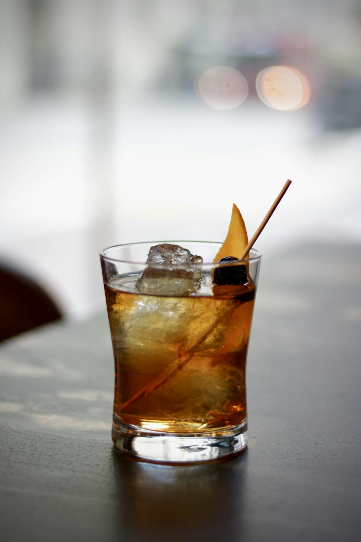 a close up of a glass cup on a table