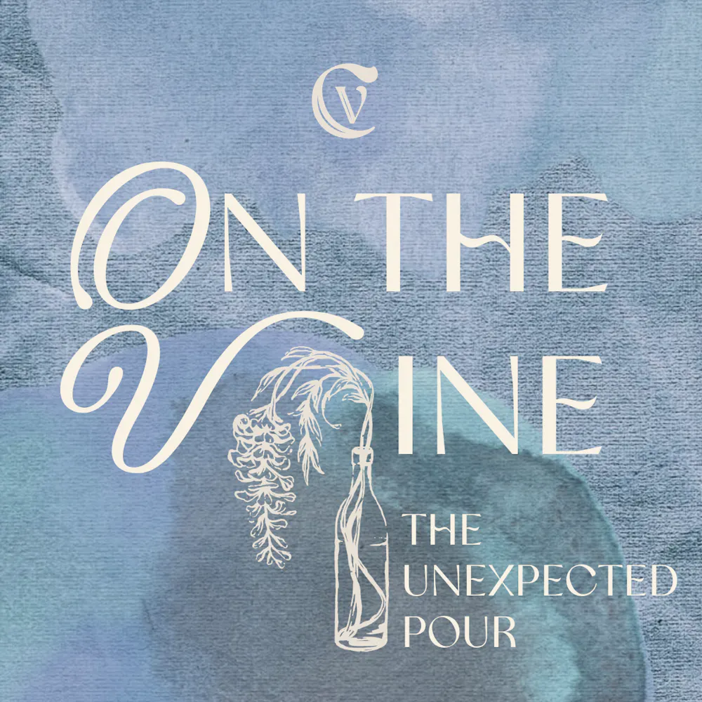 a blue and white label with a bottle and a branch