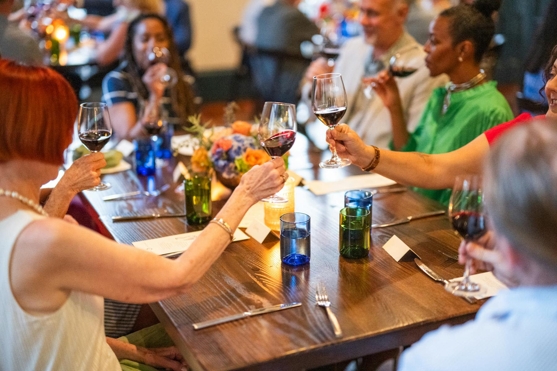 a group of people sitting at a table