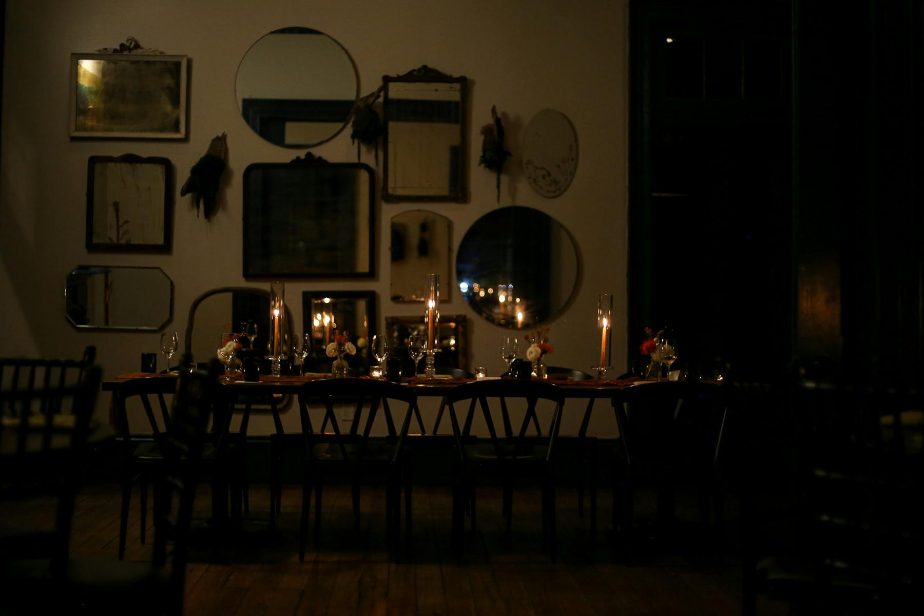 a person sitting at a table in a room