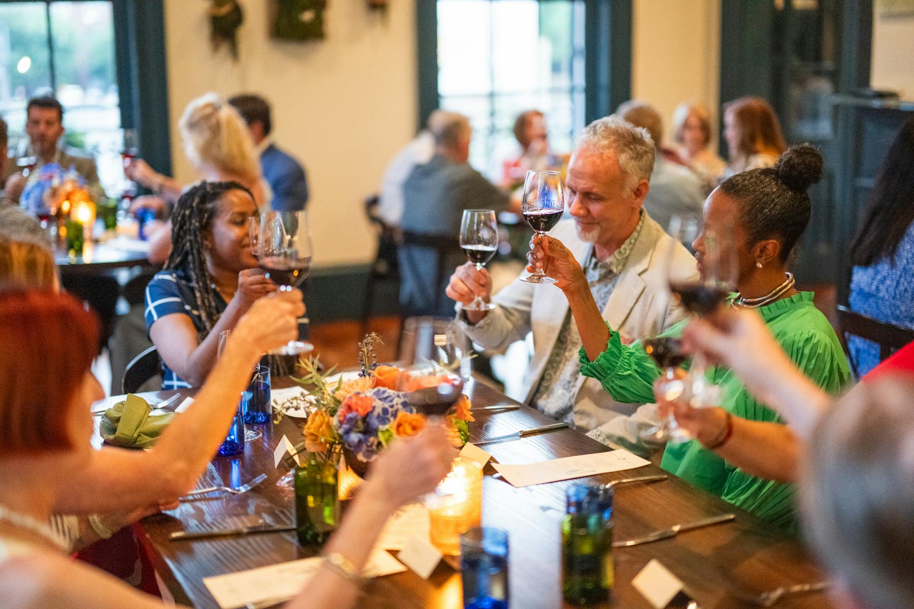 a group of people sitting at a table