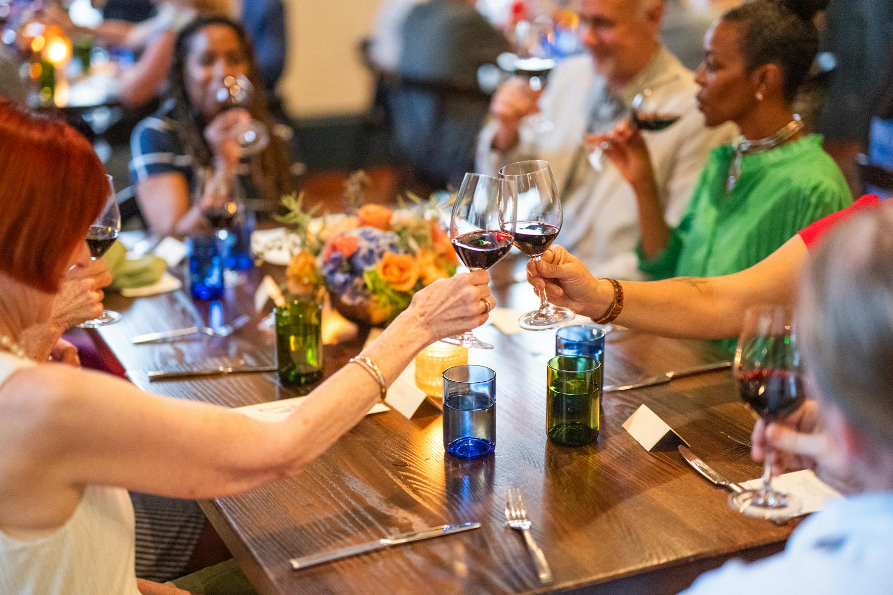 a group of people sitting at a table