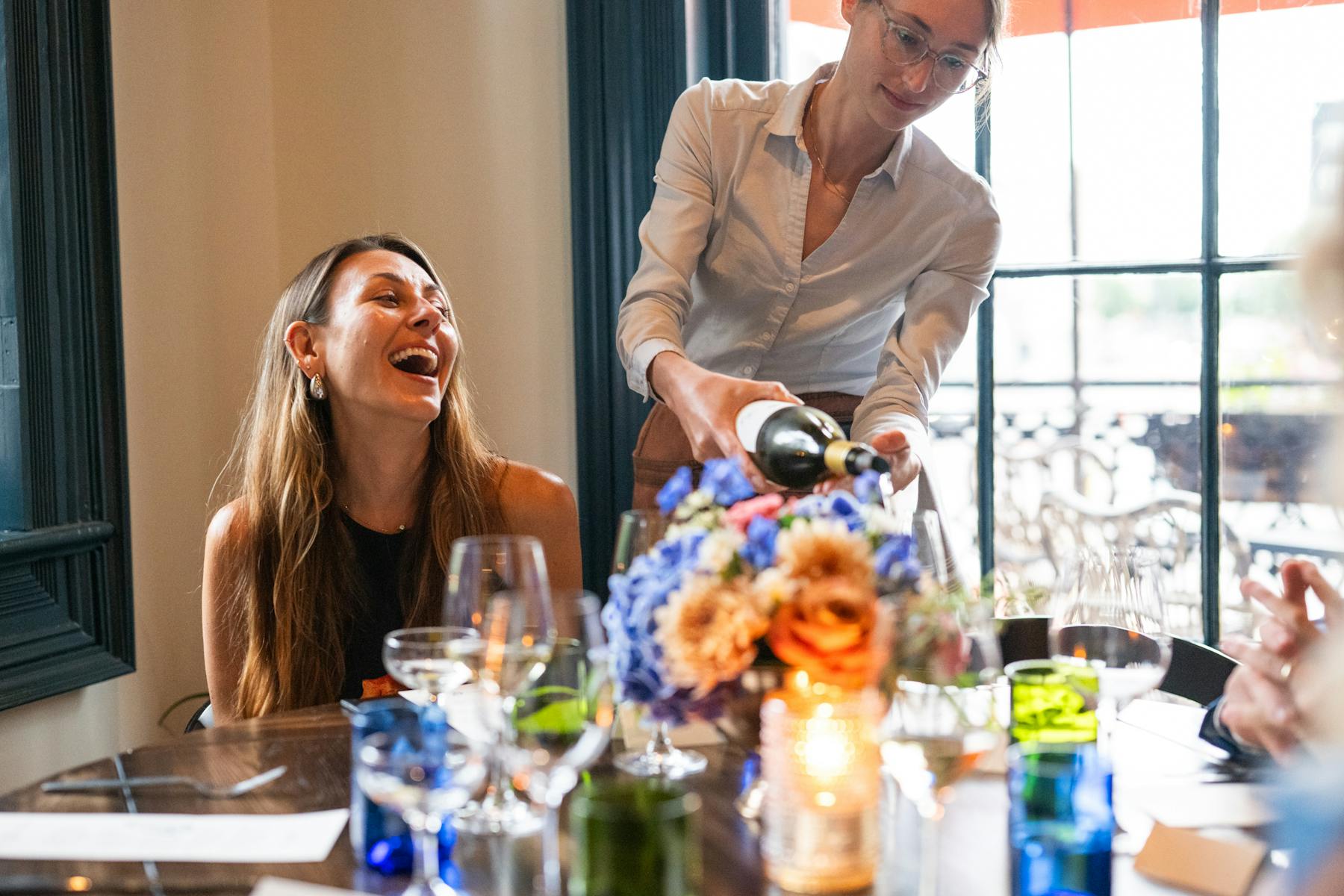 a man and a woman sitting at a table