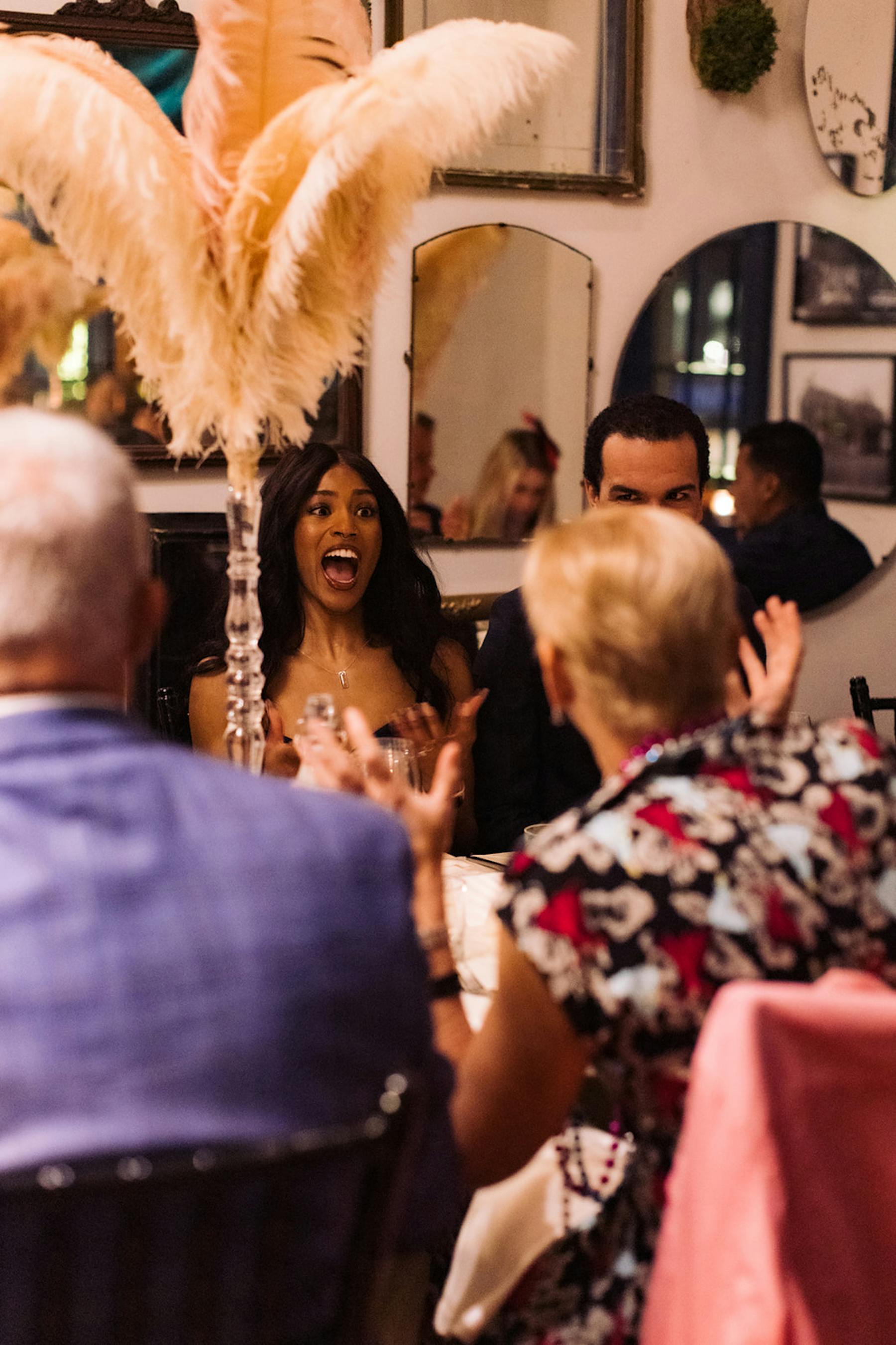 people talking around a table 