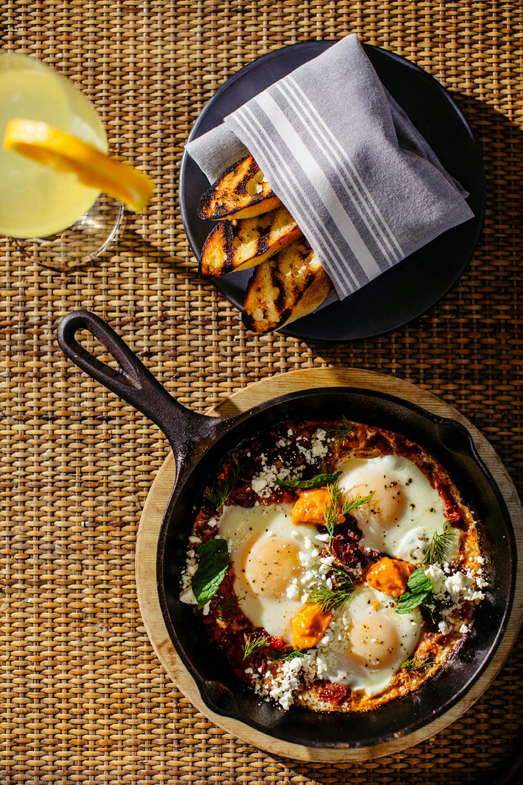 a plate of food sitting on top of a pan on a table