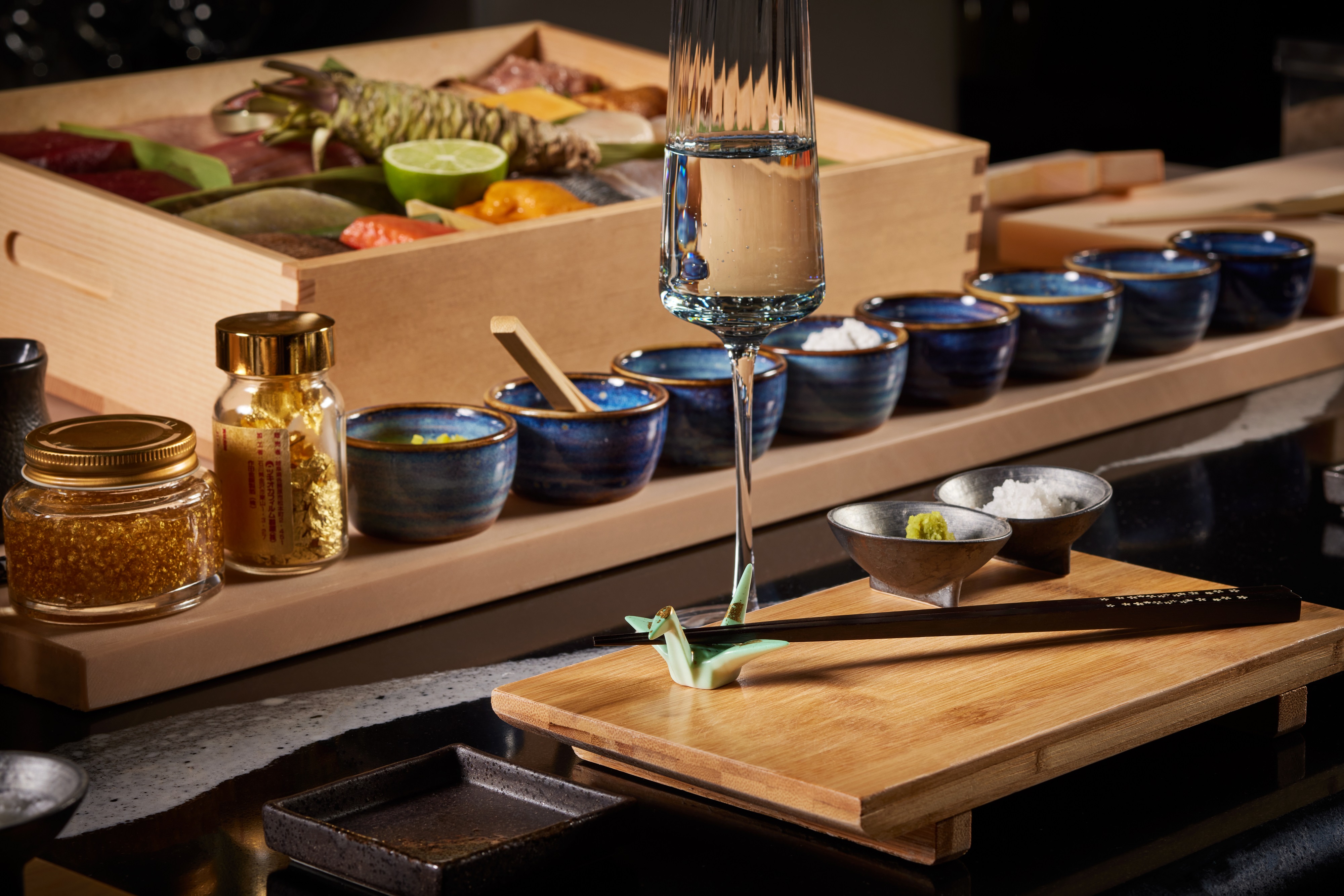a table topped with plates of food on a counter