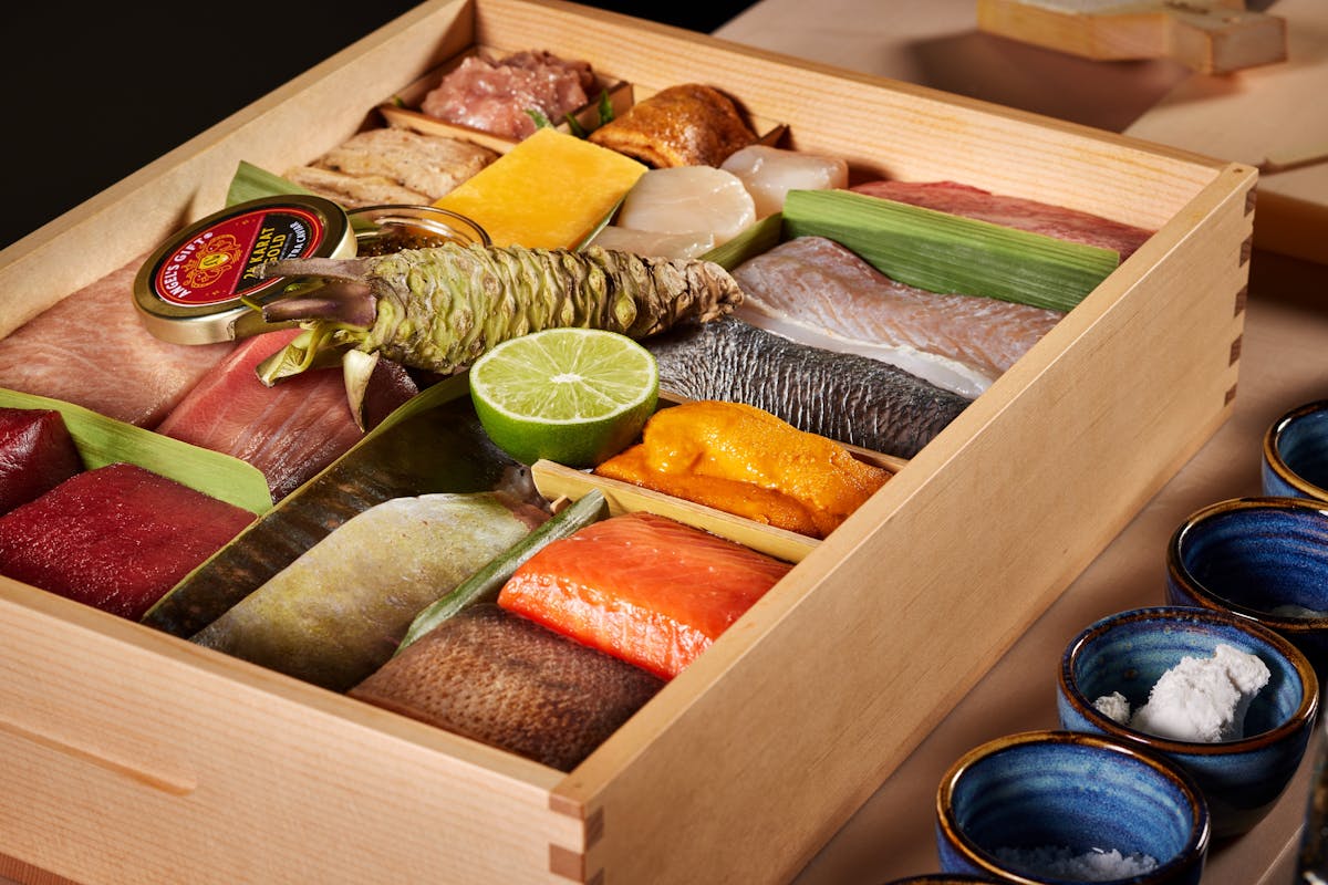 a box filled with different types of food on a table