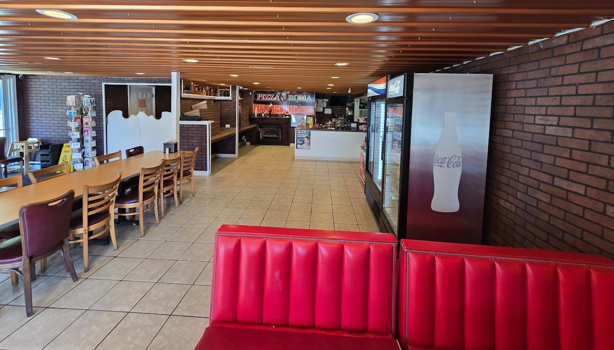 a chair sitting in front of a building