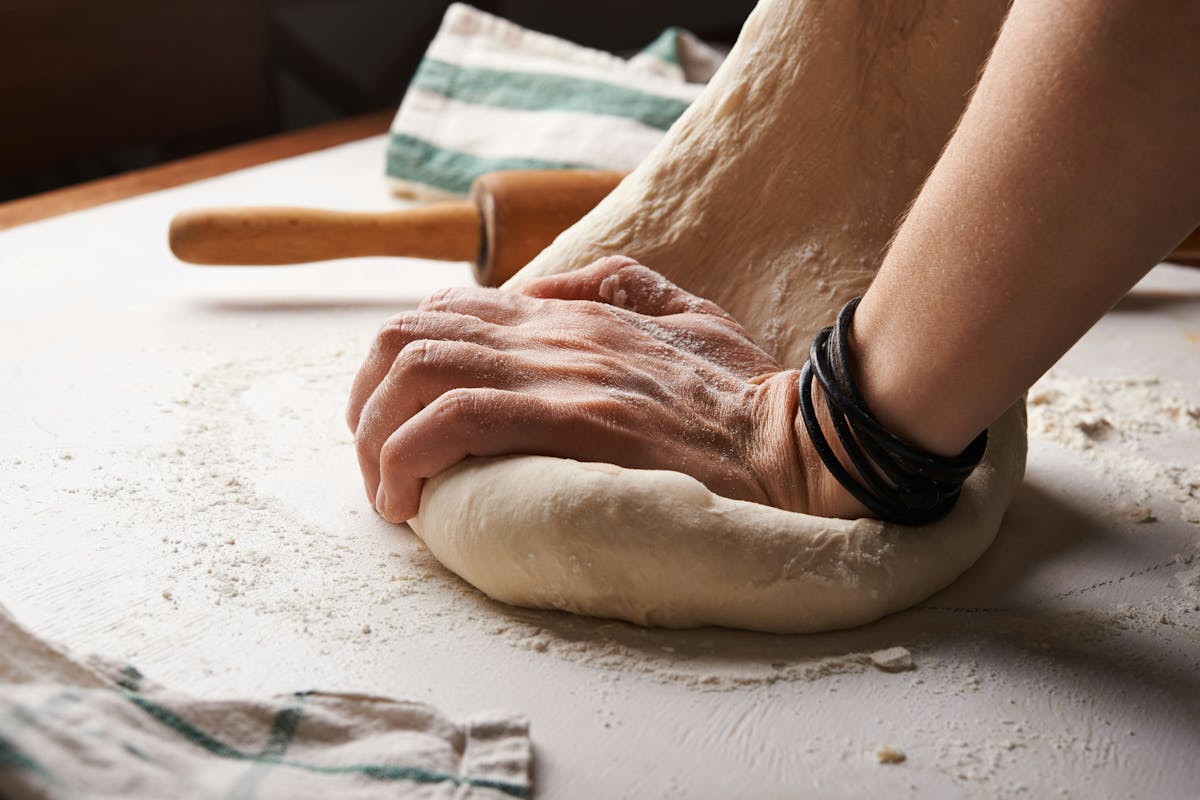 a close up of a person sitting on a table