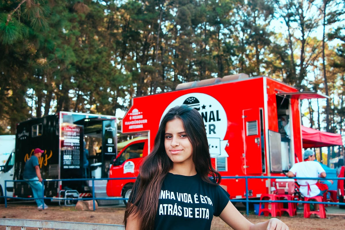 a person standing in front of a truck