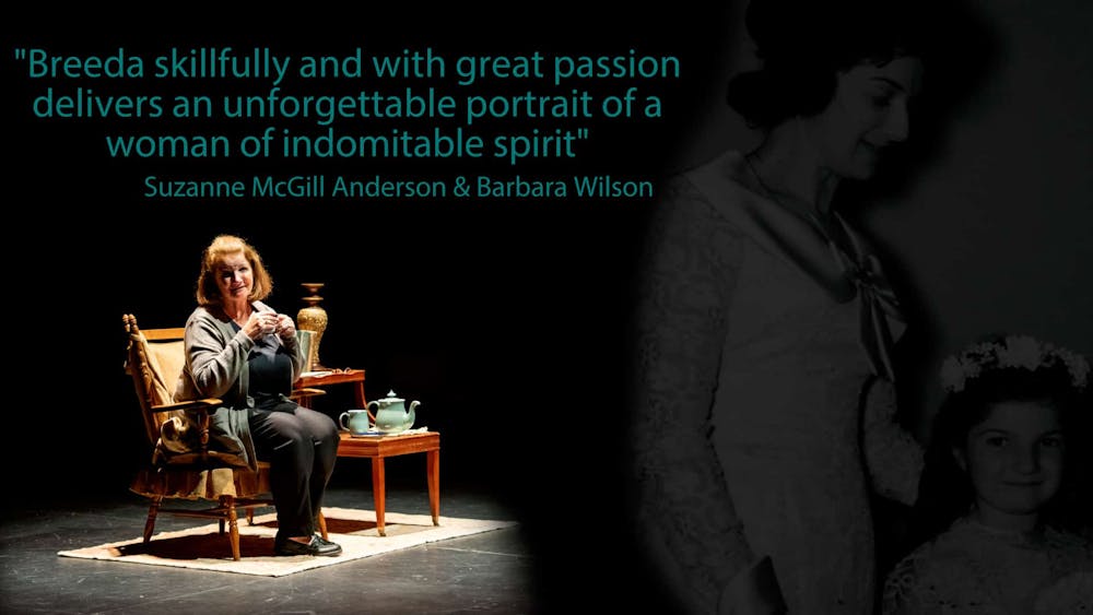 a man and a woman sitting on a table