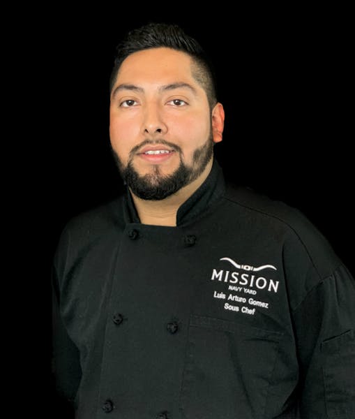 a man wearing a black shirt