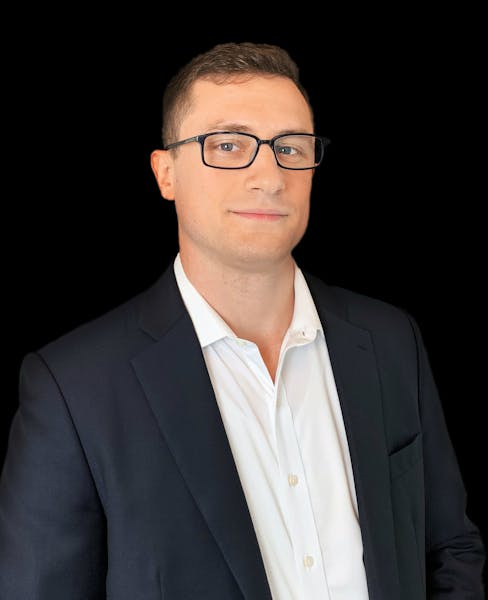 a man wearing a suit and tie