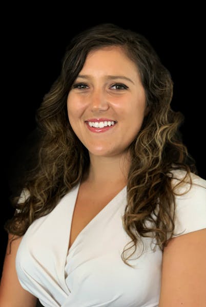 a woman wearing a white shirt