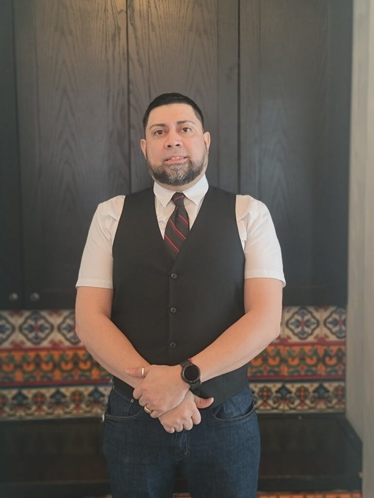 a person wearing a suit and tie