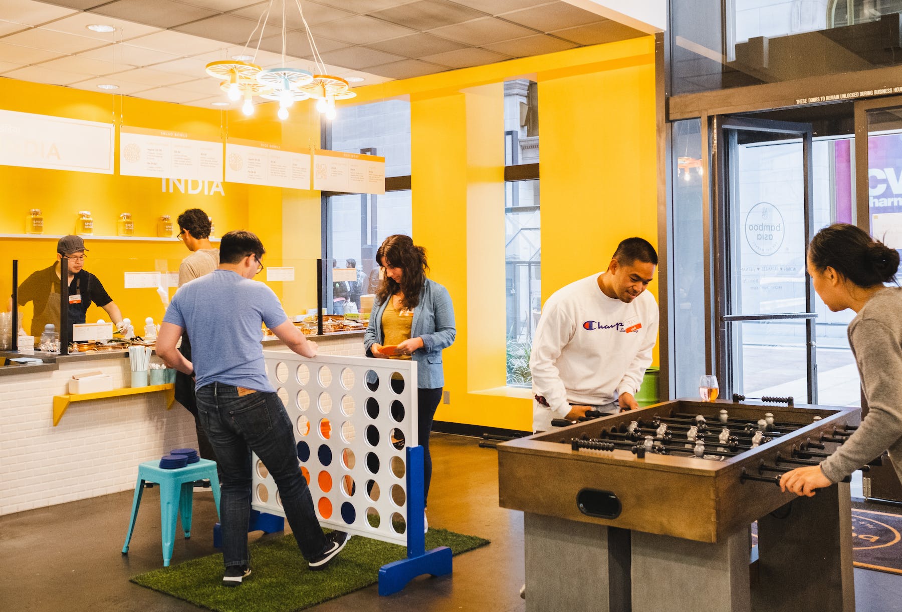 a group of people playing instruments and performing on a counter