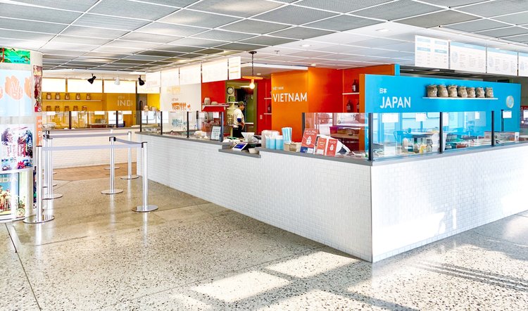 a person standing in front of a store