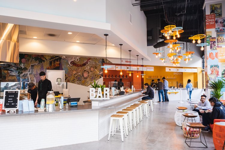 a group of people performing on a counter