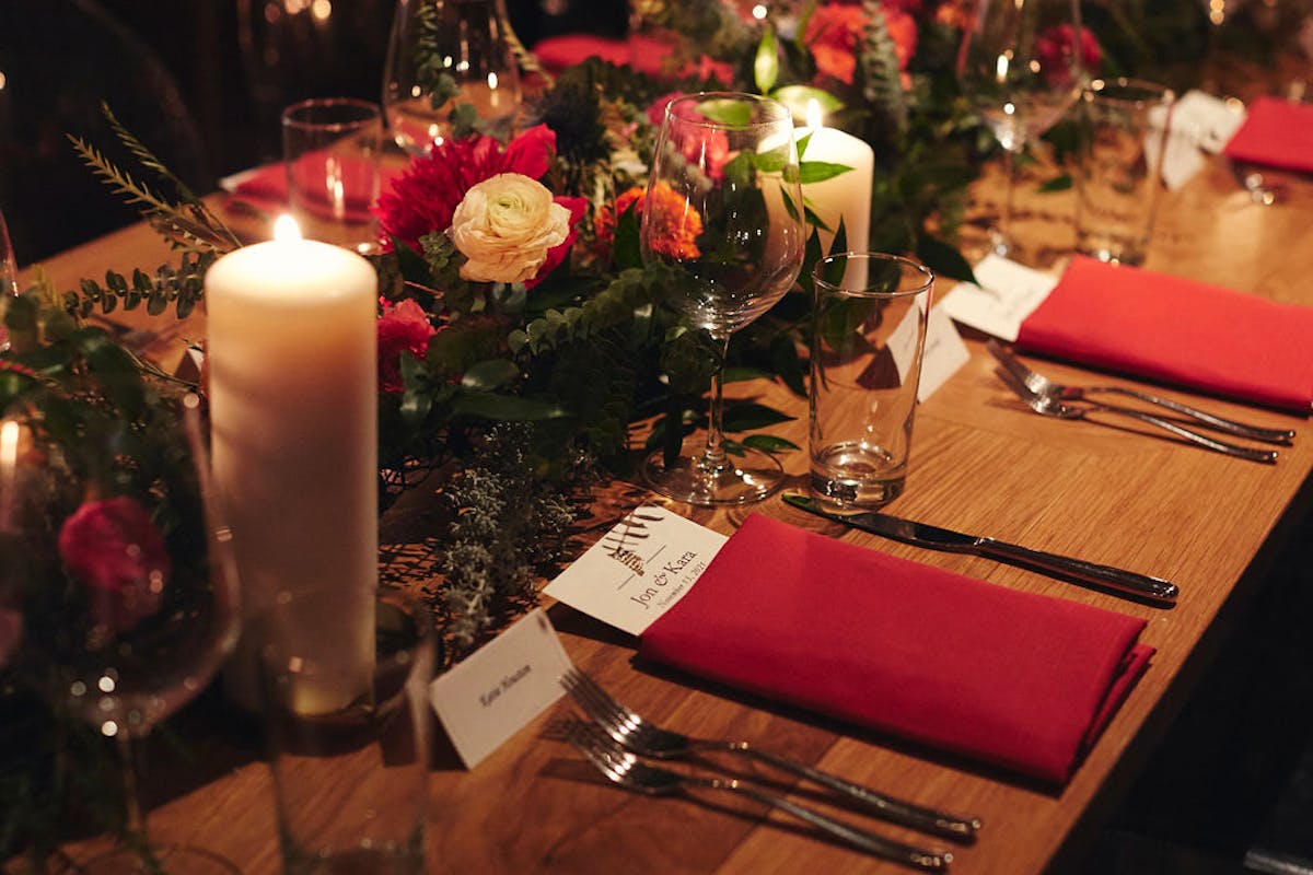 a table topped with glasses of wine