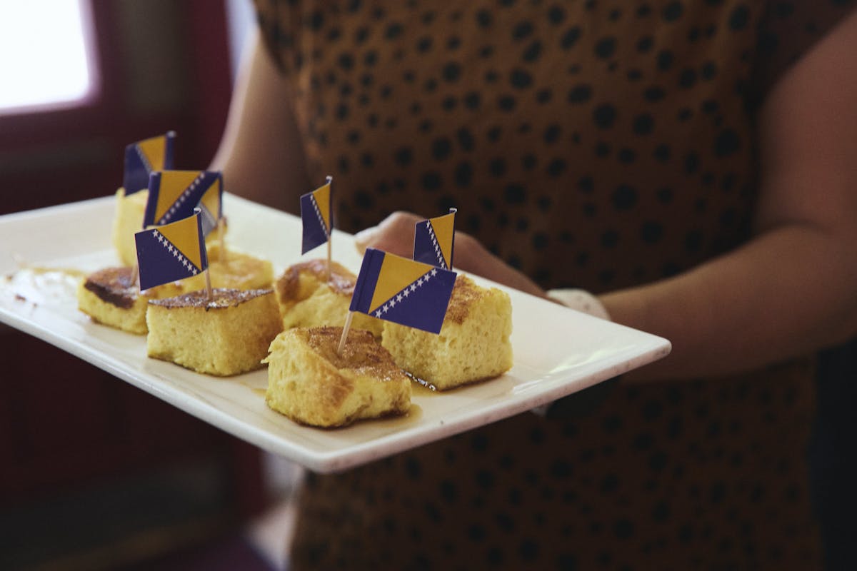 a tray of food on a plate on a table