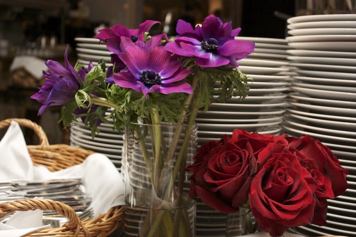 a vase of flowers on a table