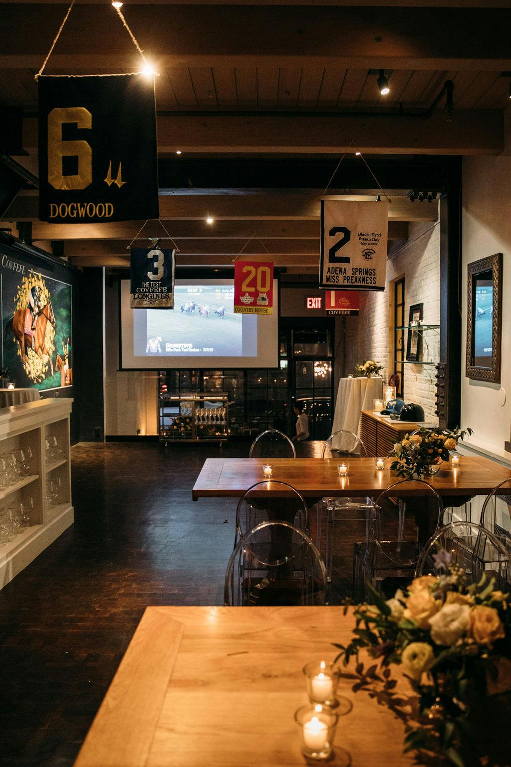 a room filled with furniture and a table in a restaurant