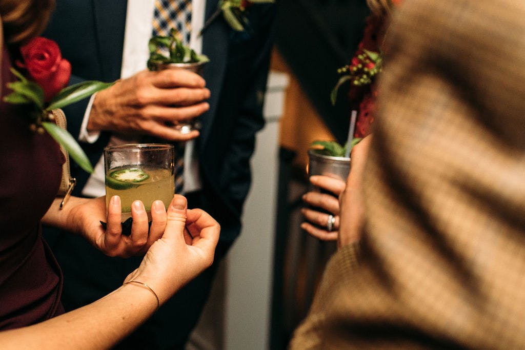 a person holding a glass of wine