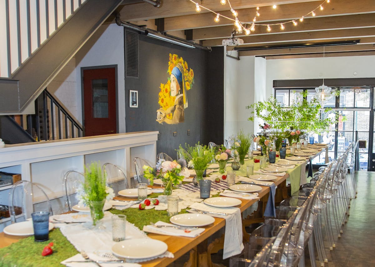 a dining room table in front of a building